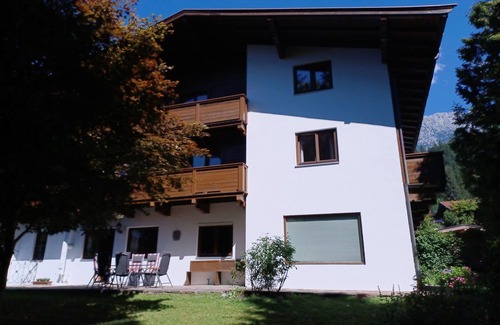 Scheffau am Wilden Kaiser Apartment | Spacious vacation apartment with fireplace + children's play corner, 10 + 2 persons