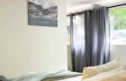 Walmer House | Spacious 1 bedroom unit with a private entrance and carport parking spaces