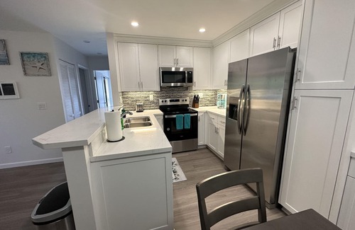Crown Point Apartment | Spacious 2 bed 2 bath one block from the Bay! ! !