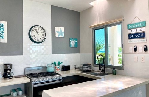 Chelem Apartment | Spacious 2-bedroom condo with pool and beach views