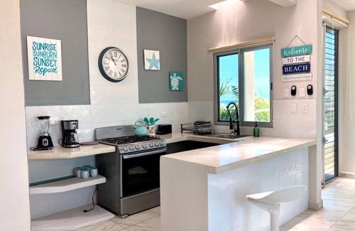 Chelem Apartment | Spacious 2-bedroom condo with pool and beach views
