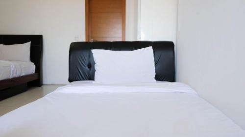 Surabaya Apartment | Spacious 2BR with Access to Mall at Aryaduta Residence Surabaya Apartment By Travelio