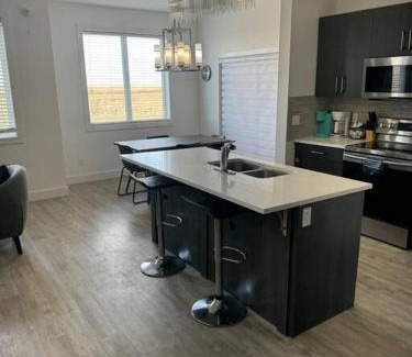 Regina Apartment | Spacious 3 bed 2 bath with attached garage