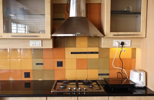 Shanthala Nagar Apartment | Spacious 3-Bedroom Apartment with AC, WiFi in Vibrant Central Bangalore