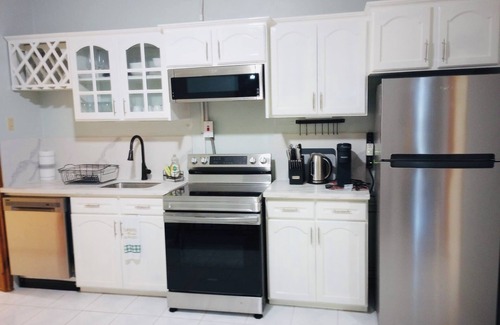 Lucea Apartment | Spacious 4-bedroom apartment in charming Lucea, Hanover. Walk to the beach!