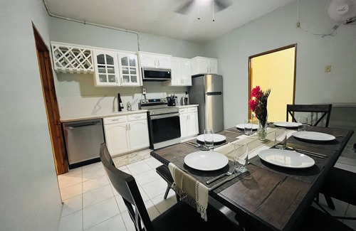 Lucea Apartment | Spacious 4-bedroom apartment in charming Lucea, Hanover. Walk to the beach!