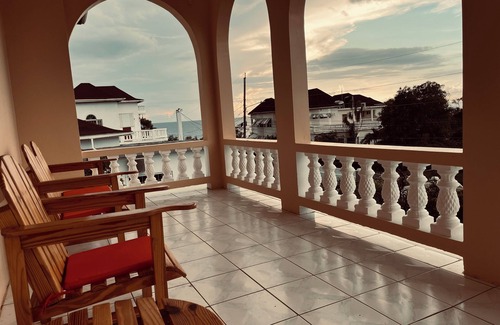 Lucea Apartment | Spacious 4-bedroom apartment in charming Lucea, Hanover. Walk to the beach!