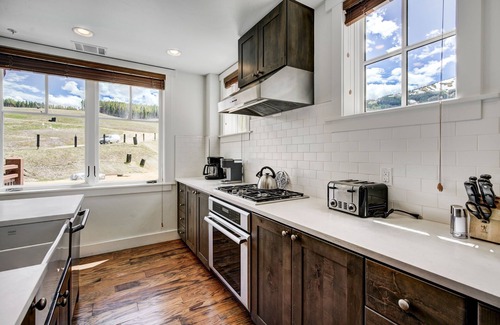 Peak 8 Condo | Spacious 4 Bedroom Steps From Winter Activities Condo by RedAwning