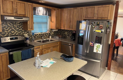 Oxford House | Spacious 4-BR, 3 BA house in charming Oxford. Less than 3 miles to square & OM.