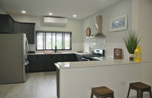 Tower Isle House | Spacious 6-bedroom house with WiFi and AC in charming St. Mary Parish