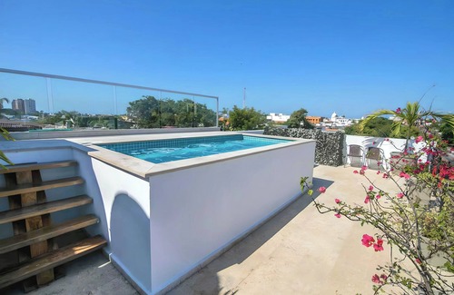 Cartagena District House | Spacious 9-bedroom house with WiFi, AC in vibrant Cartagena Bolivar +Bonus