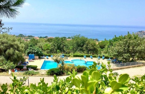Ricadi Apartment | Spacious 9-bedroom apartment with WiFi, AC in enchanting Ricadi