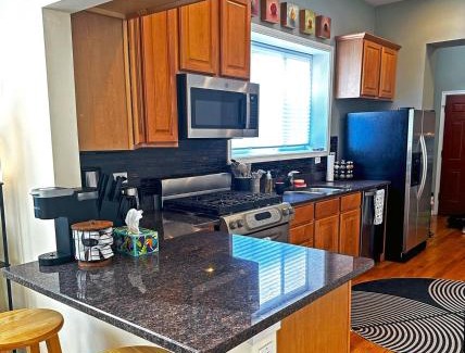 West Town Apartment | Spacious and Modern 3BD 2BA Home- Garage Parking!