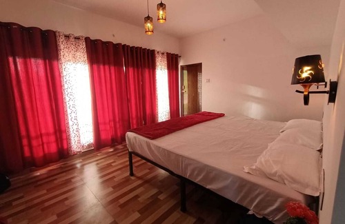 West Mere House | Spacious and serene space with Tea Estate view from every room.n