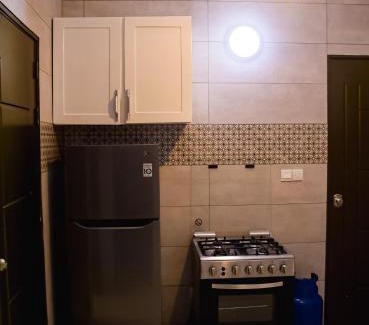 Lome Apartment | Spacious Apt with Patio & Rooftop in Cité Baguida