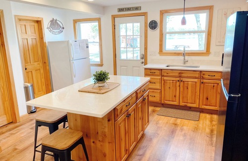 The Bays House | Spacious Beachfront Lakehouse, w/Lg Front Yard, Dock, & Mountain Views!