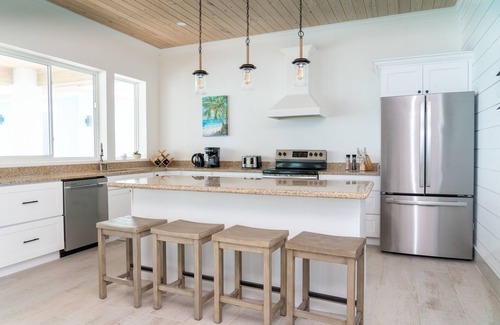 Rokers Point House | SPACIOUS BEACHFRONT HOME! A vacation to treasure! Sandy beach, pool, hot tub.