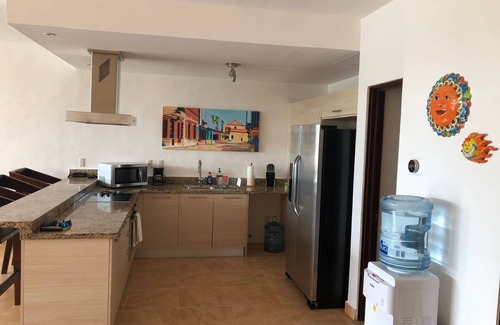 Puerto Aventuras Condo | Spacious condominium with stunning water views
