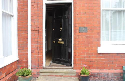 Llandrindod Wells Apartment | Spacious & Cozy Mid Wales Town Centre Apartment, With Bike Storage