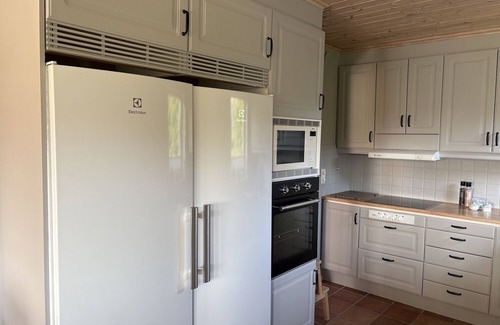 Ellos House | Spacious holiday home in Ellös, 300 m to a beautiful sandy beach | SE09113