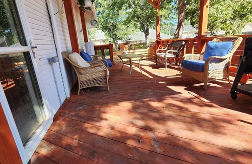 Scottsbluff House | Spacious home in downtown Scottsbluff with hot tub and large backyard deck.