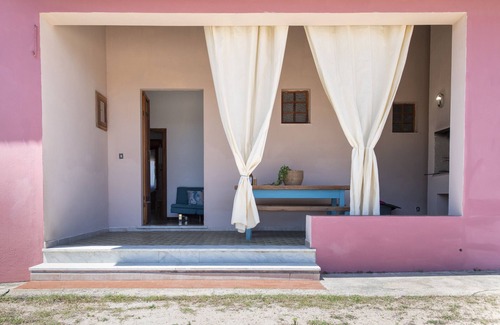 Paduledda House | Spacious House in Costa Rossa with Partial Sea View and Terrace