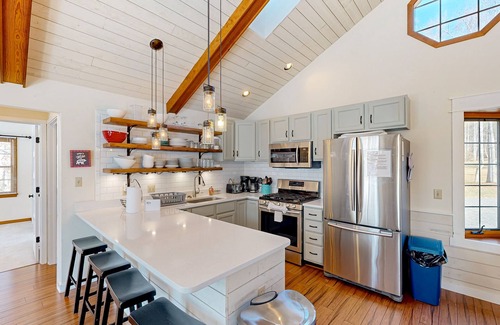 Bumpass House | Spacious house with water view, kayaks, foosball table, deck, firepit