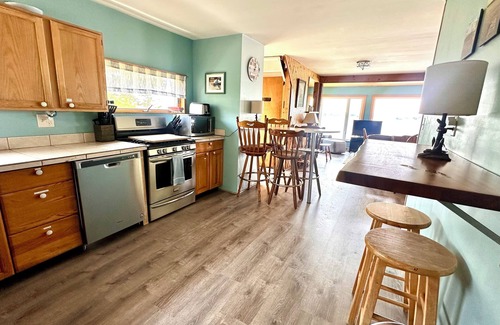 Conneaut Lakeshore House | Spacious lakefront home with private dock and a panoramic view of Conneaut Lake.