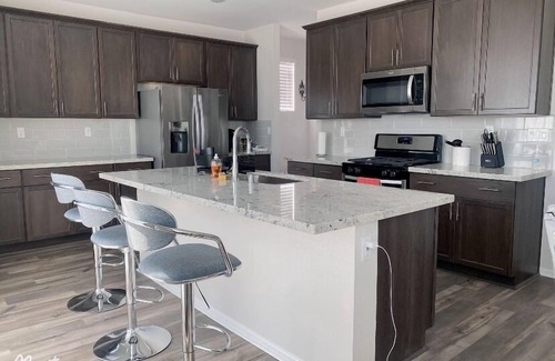 Riverside House | Spacious Master Room With Private Bathroom And Office Area