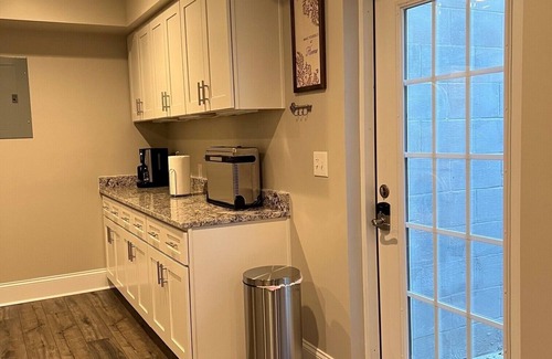 Concord Apartment | Spacious Split-Level, Basement Apt. w/Gorgeous Sunroom Overlooking Wooded Area.