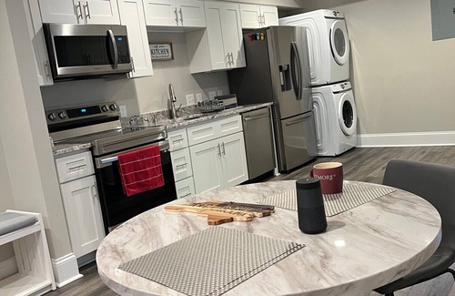 Concord Apartment | Spacious Split-Level, Basement Apt. w/Gorgeous Sunroom Overlooking Wooded Area.