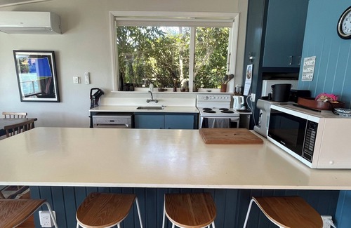Wainui House | Spectacular views at Wainui Waterfront haven - Piwakawaka Retreat