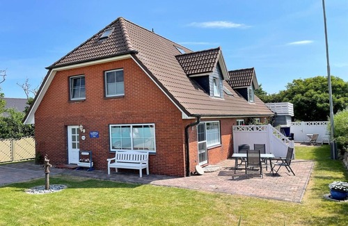 Dagebuell Apartment | Speelwark- directly on the dyke in Dagebüll with terrace and beach chair