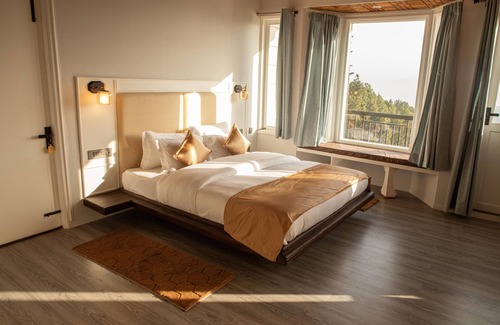 Kausani Hotel | Spellmount - Himalayan View Infinity Pool Resort in Kausani