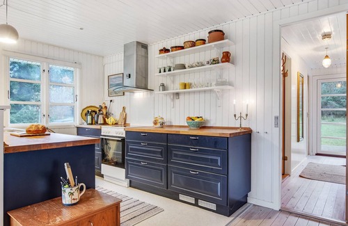 Faarevejle House | Spend a wonderful vacation with the whole family in this cozy cottage near the sea.