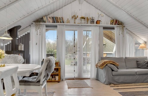 Faxe Ladeplads House | Spend some quality time with the family in this bright vacation home.