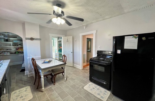 Issue Cottage | Splash n' Paradise A Tropical Swimming Oasis with the warmth of Palm Trees