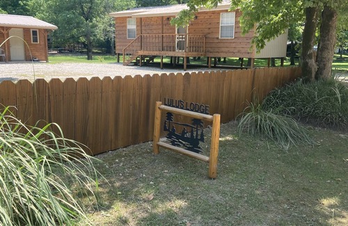 Mammoth Spring Cabin | Spring River Cabin at Saddler Falls with large yard, firepit and swing!