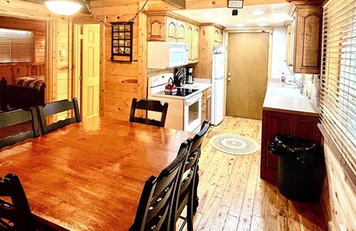 Island Park Cabin | Spruce Fly on Bill's Island! Enjoy four private bedrooms and 2 full bathrooms!