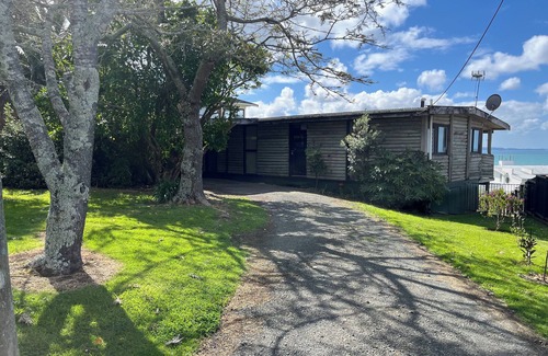 Stanmore Bay House | Stanmore Bay Log Cabin - Sea Views