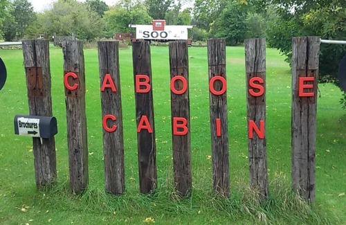 Sparta Cabin | Stay aboard a Caboose!