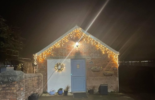 Whiteabbey Cottage | Stay beside the sea - Coastguard Boathouse - self contained cottage.