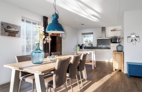 Akkrum House | Stay in our spacious Sneekermeer 6 home with private jetty.