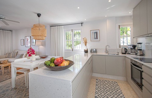 Nerja Apartment | Stay in tropical garden within walking distance to sea and Nerja town