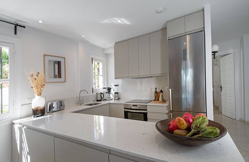 Nerja Apartment | Stay in tropical garden within walking distance to sea and Nerja town