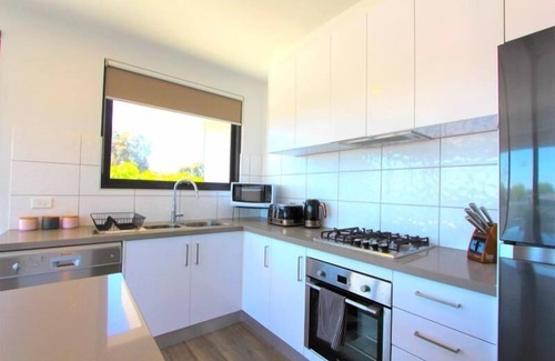 Heidelberg West Apartment | StayCentral - Heidelberg Heights Penthouse - Waterdale Road, Heidelberg Heights - 2 Bedrooms, 2 Beds, 1 Bathrooms, 1 secure undercover parking spot (extra parking on street).