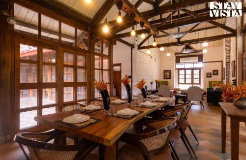 Sangavi Villa | StayVista at Orchard by the River with Bonfire, BBQ
