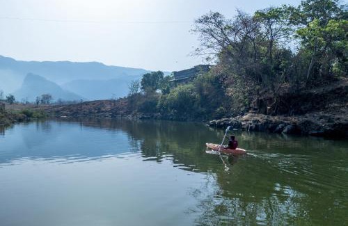 Mangaon Khurd Villa | StayVista's Basalt - with Mountain Views, Infinity Pool, Vintage Interiors, and Games Room