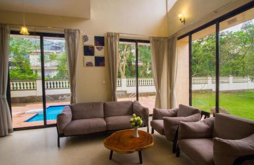 St.Stanislaus Villa Villa | StayVista's Greenwoods Villa 10 - City-Center Villa with Private Pool, Terrace, Lift & Carrom Board