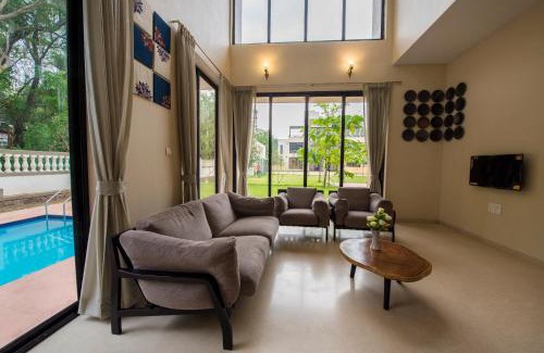 St.Stanislaus Villa Villa | StayVista's Greenwoods Villa 10 - City-Center Villa with Private Pool, Terrace, Lift & Carrom Board
